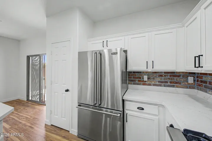 Renovated Kitchen with Viking Appliances including Gas Range, New Quartz Counters, Backsplash & Cabinets!