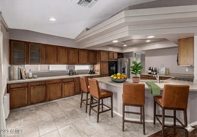 Beautiful Kitchen with extended cabinets island seating.