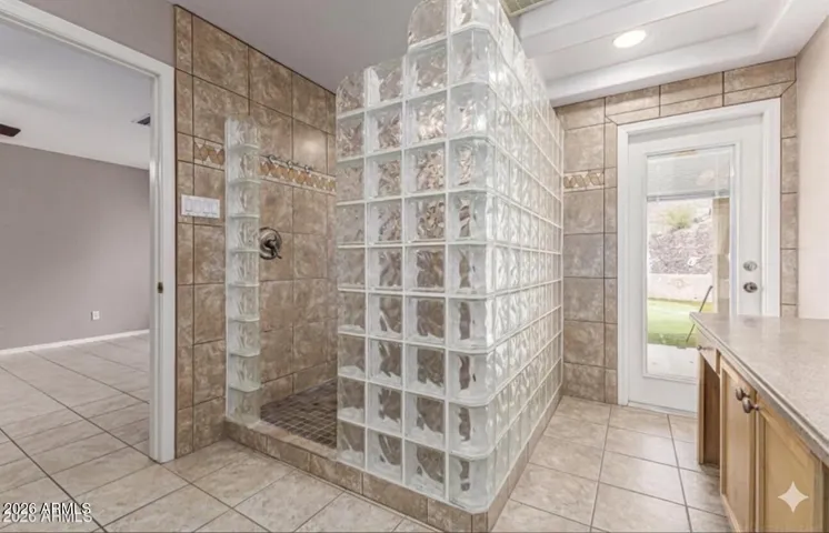 Door out to backyard makes for easy access and adds light!