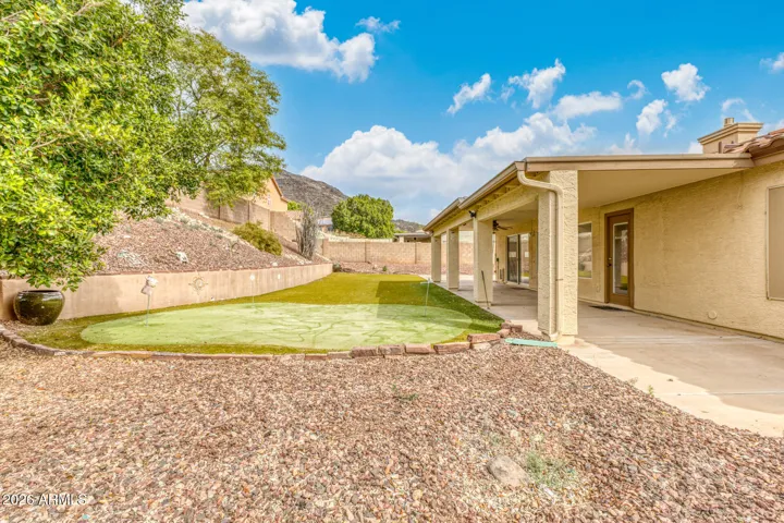 Putting green and patio for entertaining!