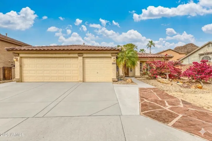 Large yard with mountain views and popular 3-car garage in sought-after location!
