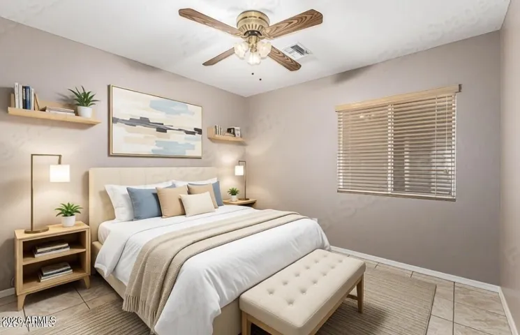 Large Primary Bedroom with windows to backyard oasis.