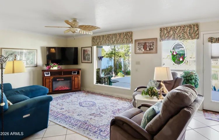 Family room w/large picture windows overlooking the lake