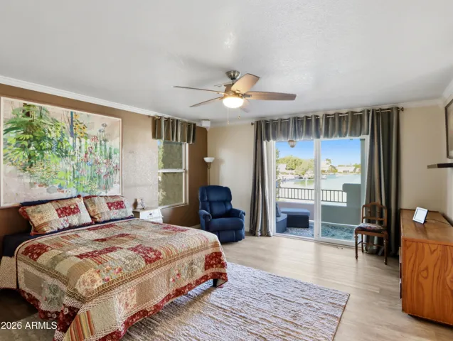 patio doors leading to patio/balcony overlooking the lake