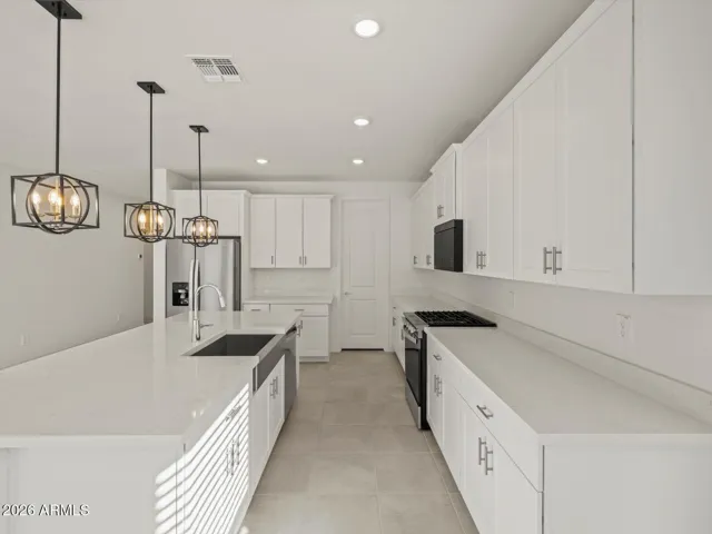 Photo is not of the actual home. Interior finishes and fixtures may vary.