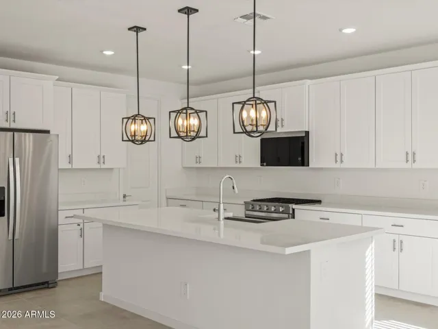 Photo is not of the actual home. Interior finishes and fixtures may vary.