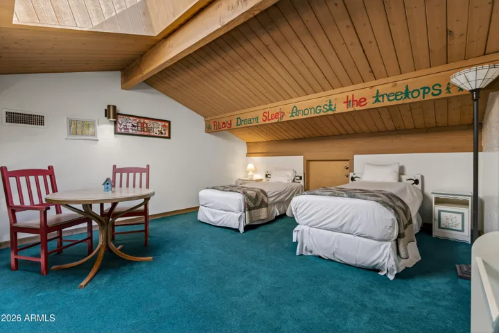 Sleeping Space three - with two twin beds and a game table