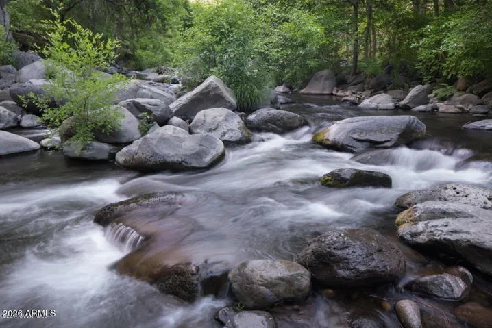Enjoy ten acres of common area - private creekfrontage