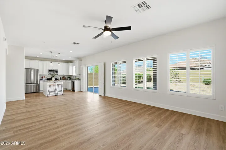 Heart of the home: kitchen meets family room with light-filled views of the backyard
