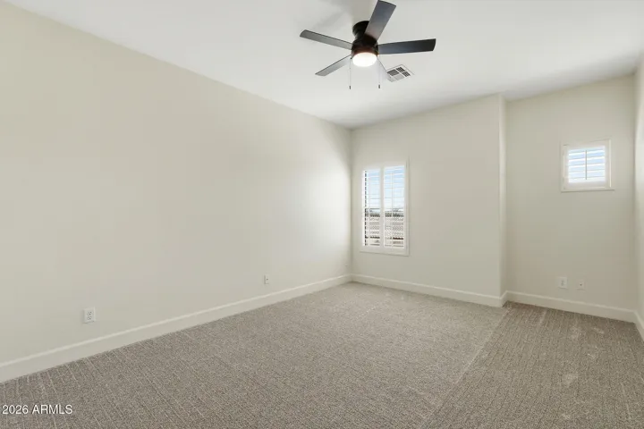 Bedrooms designed for comfort with soft carpet and natural light