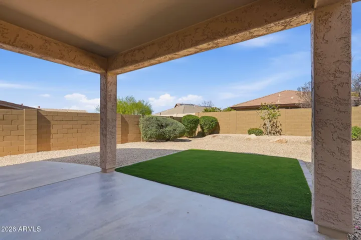 Backyard with new turf and rock - room for play, parties, or peaceful nights sitting under Arizona skies
