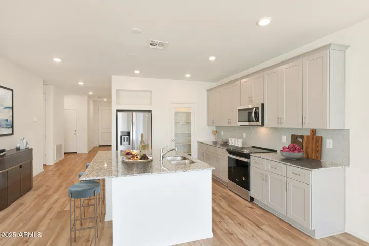 Photos may be renderings. Colors and styles may vary by home.