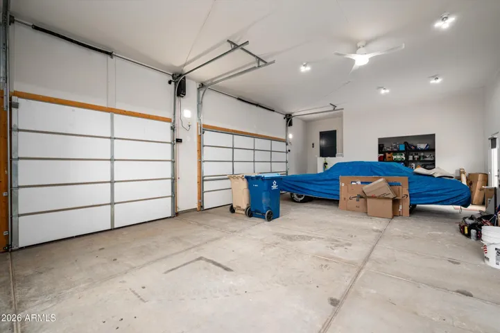High lift garage doors with high mount openers to allow for car lift.