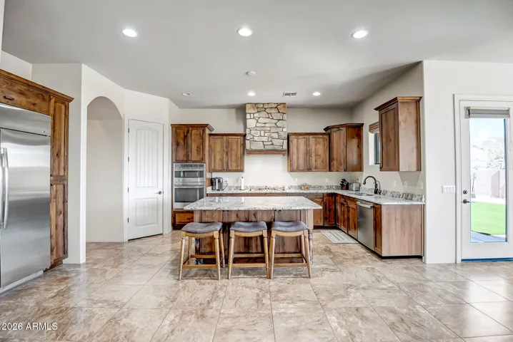 Gourmet kitchen w built in refrigerator