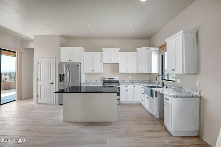 Kitchen w island (new appliances being installed)