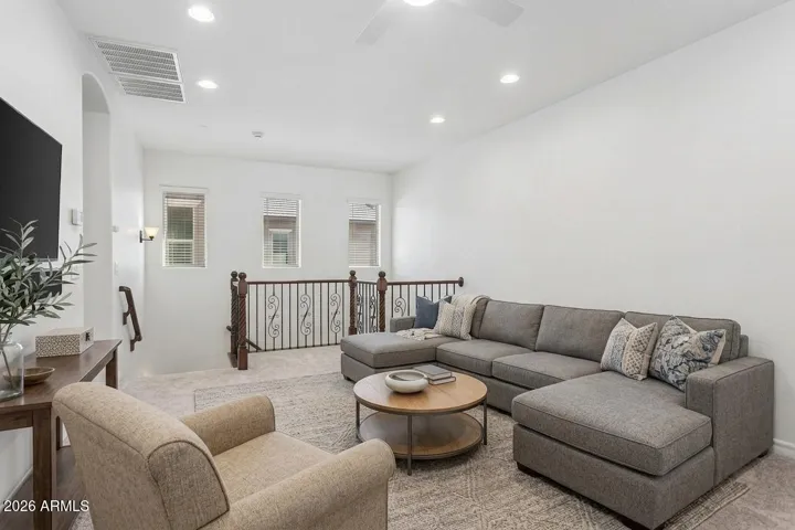 The loft could be a den, game room, home office, or whatever you need