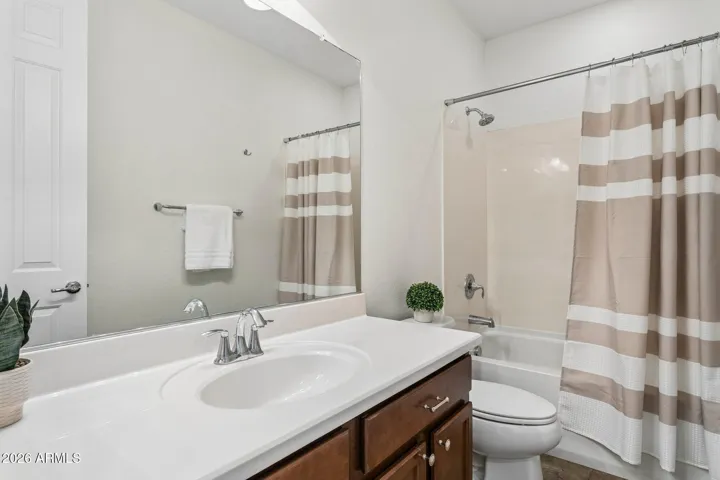 Shared hall bath has a tub/shower combination