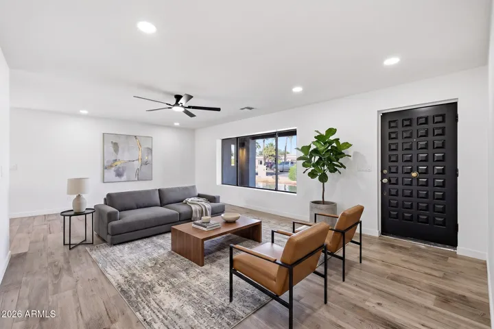 Grand entry living room. Staged photo.