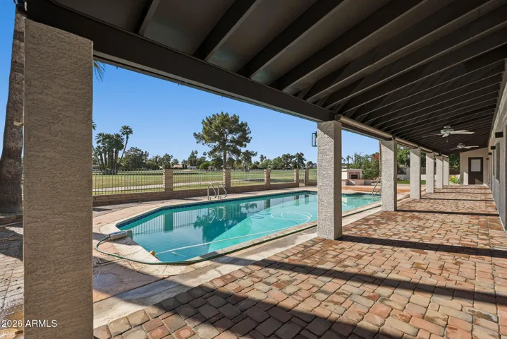 Covered patio, pool & golf course view!