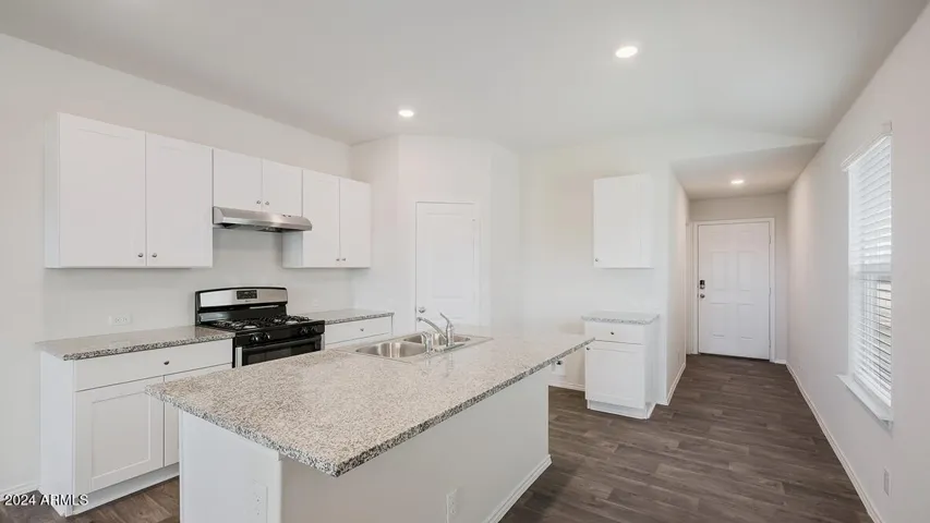 Photos are of a spec and may vary in color, interior selections and design