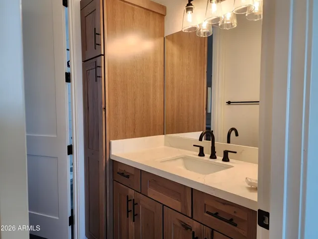 JACK'S SIDE OF THE JACK & JILL BATH. PICTURE IS OF A PREVIOUSLY BUILT SPEC.