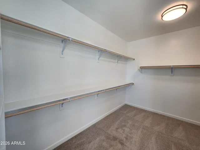 MASTER WALK IN CLOSET. PICTURE IS OF A PREVIOUSLY BUILT SPEC.