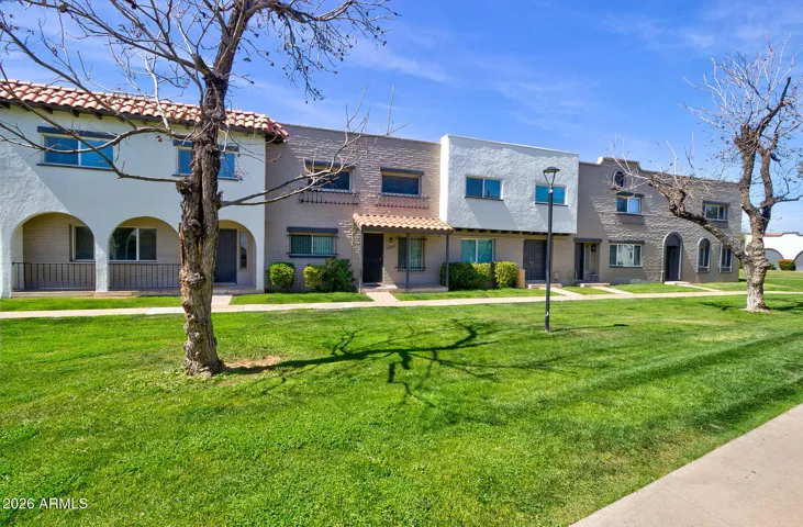 Lush green grass, maintained by HOA