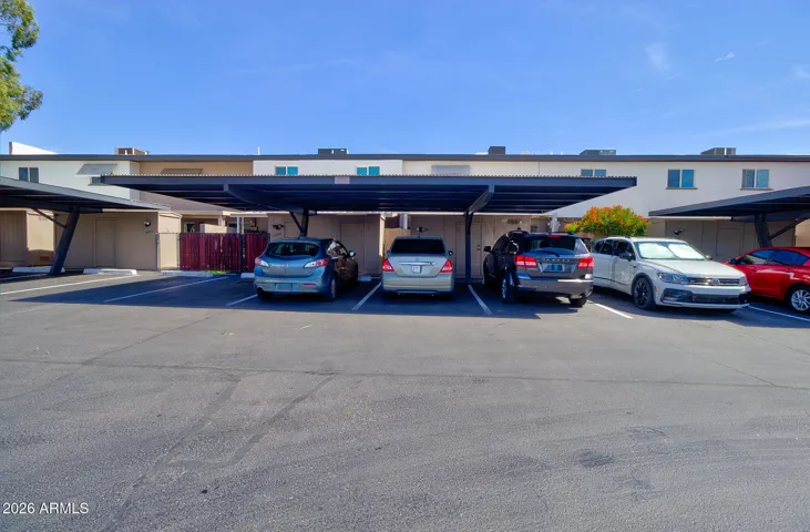 2 covered spaces assigned, 1 uncovered shared space