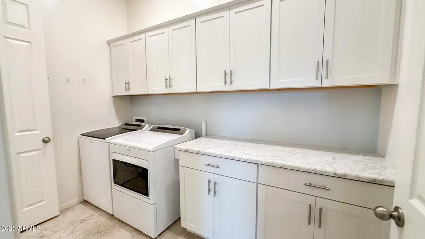 Laundry accessible via closet and living area.