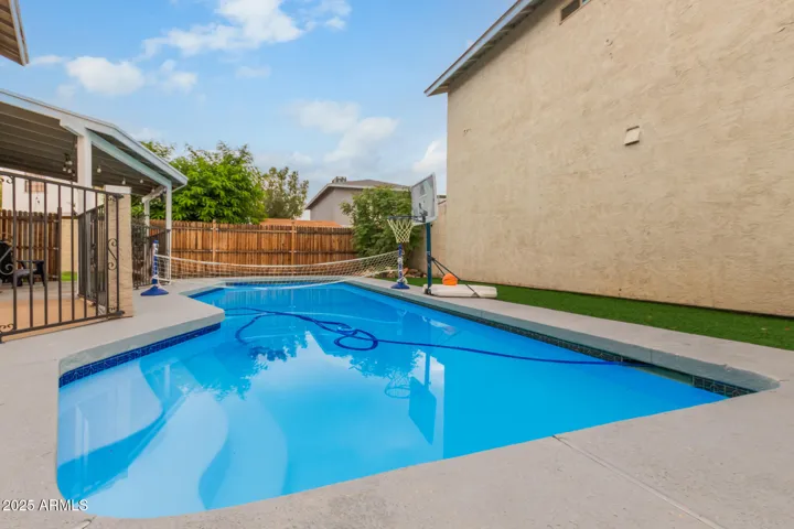 Backyard & Pool:
Your private backyard retreat! Sparkling pool, spacious patio, and room to relax or entertain under the Arizona sun.