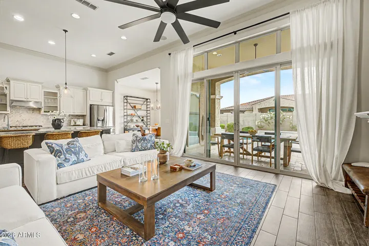 Full-length sliding glass doors bring in natural light