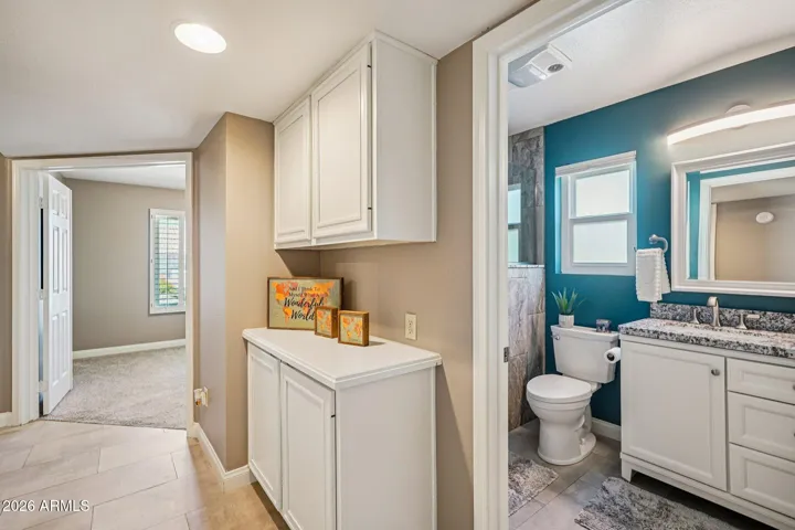The hallway and guest bathroom