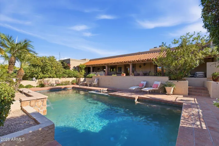 Deep diving pool with water feature and 2 fire pits