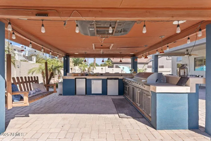 Grill, sink, griddle & multiple fridges oh my!