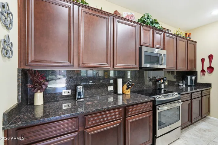 The kitchen has roll outs in the bottom cabinets. All the dishes remain