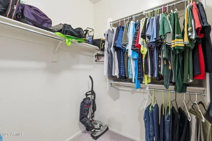 Walk-in closet has lots of room