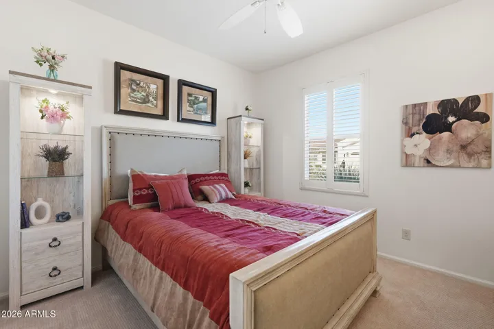 Guest bedroom has a queen size bed