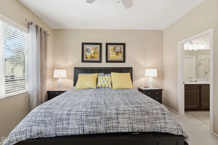 Sun shades on the window helps to keep the bedroom a little darker and cooler.