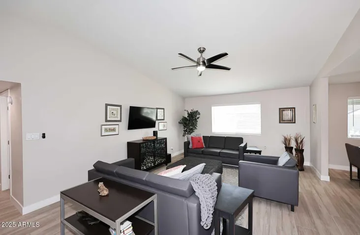 Great room has vaulted ceiling