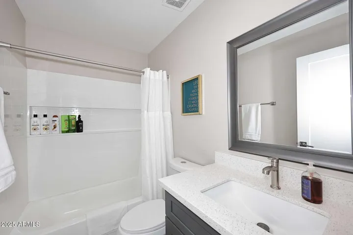 Hall bath serves guests and bedrooms 2 & 3