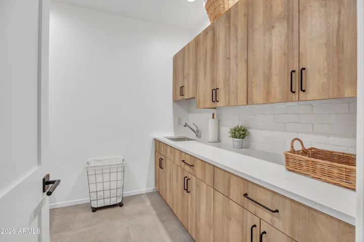 Lots of storage in laundry room.