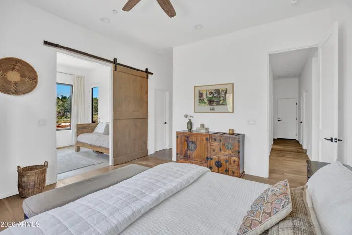 Primary Suite with barn door into an office/ meditation room