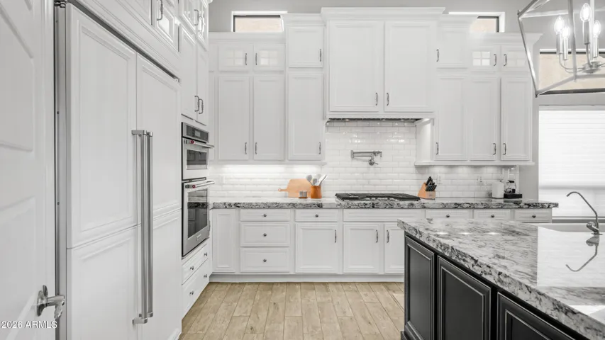 Generous Cabinetry Surrounding Customized Center Island