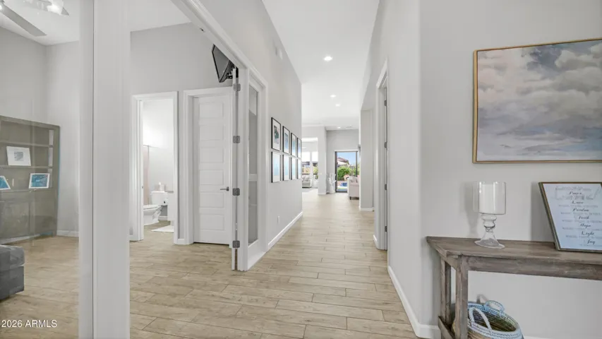 Spacious Hallway Leading into Open Living Areas