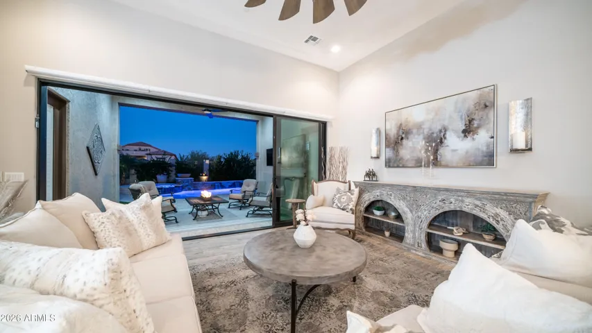 The Great Room Opens Effortlessly to the Resort Style Backyard