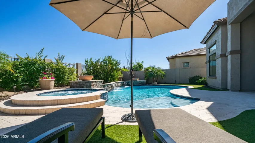 A Refreshing Pool Retreat Complemented by a Relaxing Spa