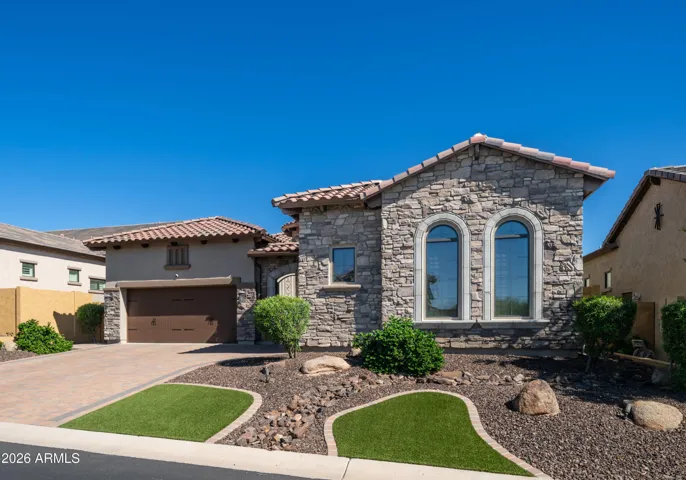 Classic Architecture and Refined Landscaping Welcome You Home