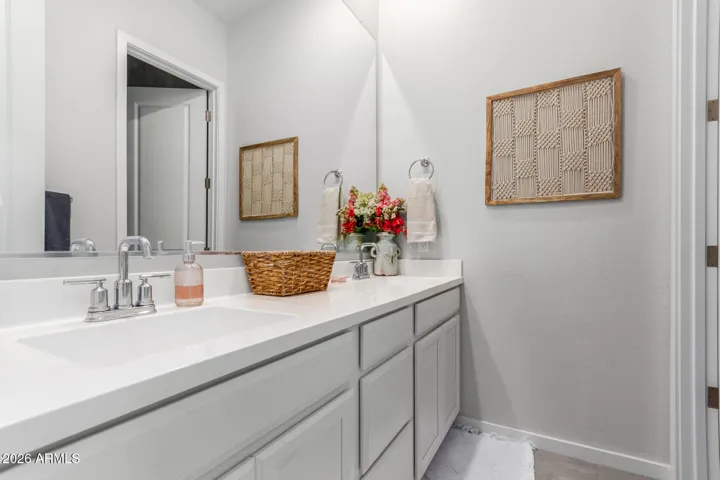 Hall Bathroom with Extended Dual Vanity. Private Tub/ Shower Area
