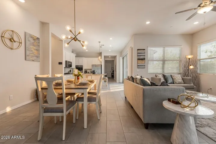 10-ft ceilings, designer lighting, and multiple 8-ft sliders offering seamless access to the private covered patio and courtyard.