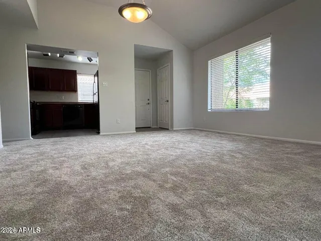 Spacious living room with dining area and fireplace
